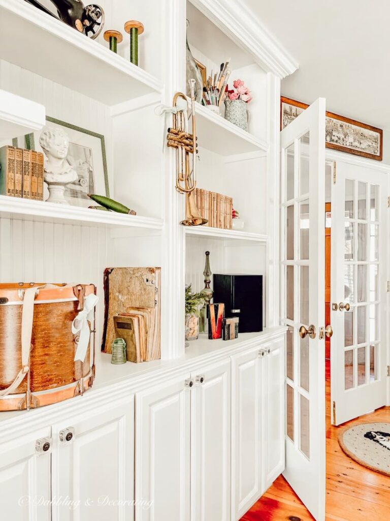 Bookshelves with musical instruments