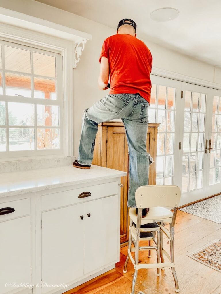 Man Removing Shelf