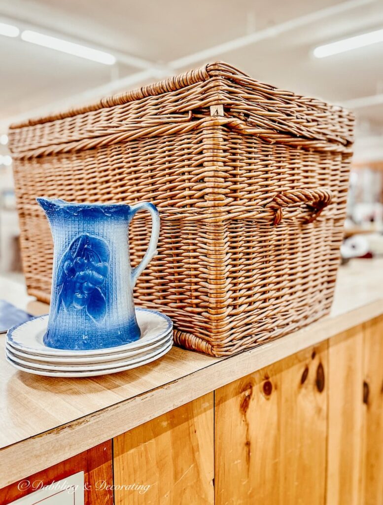 Blue Pitcher, plates, basket