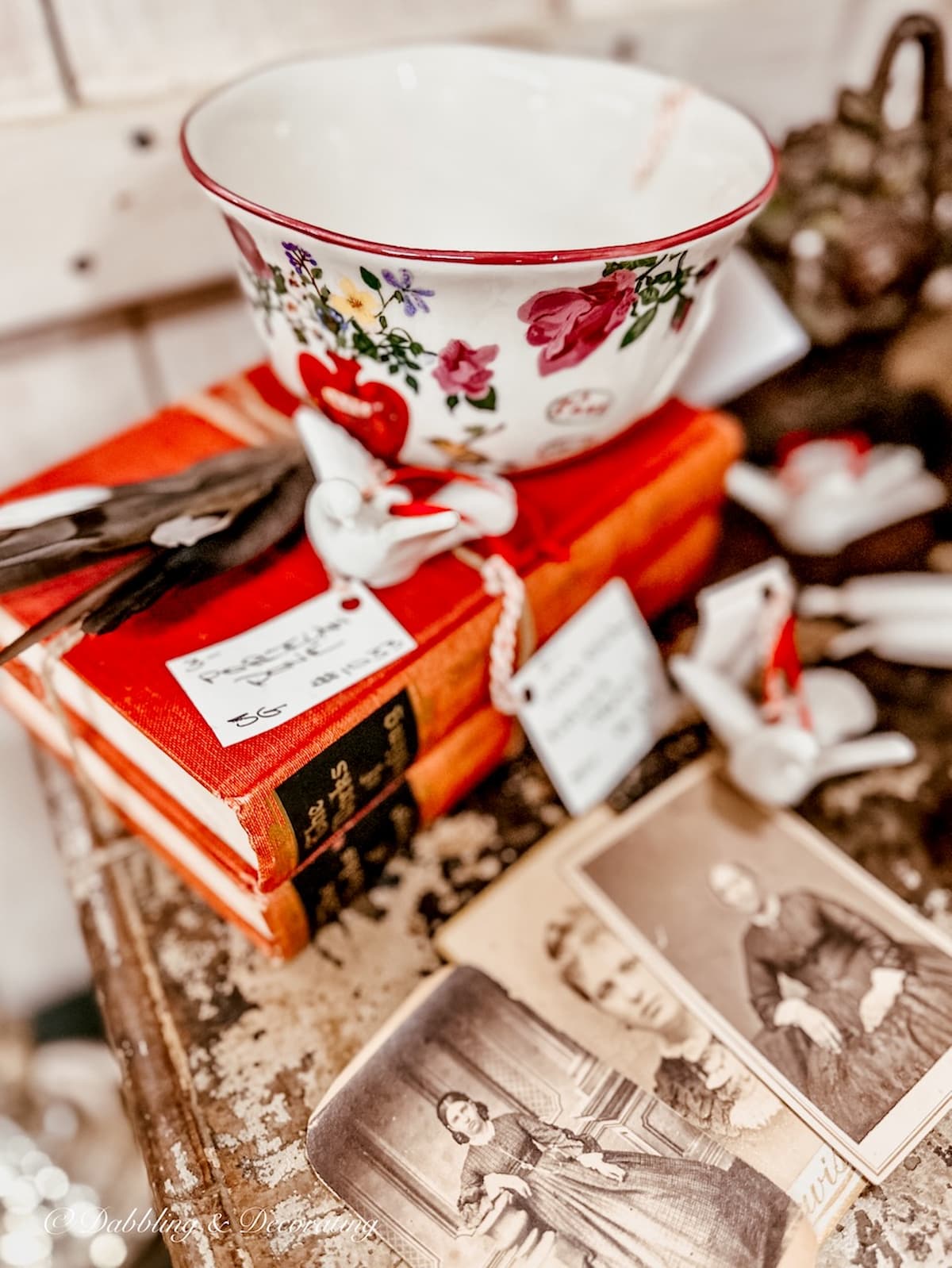 Stack of vintage old red books in antique store wrapped in twine.