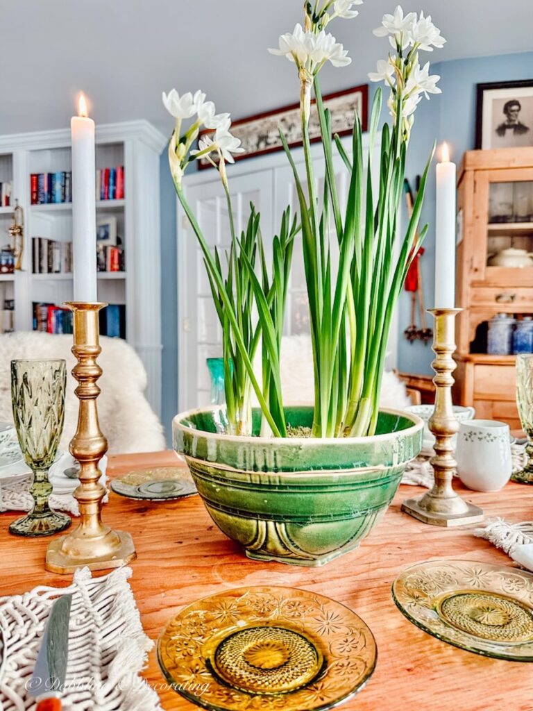 Paperwhite flowers in green stoneware bowl for Saint Patrick's Day Centerpiece