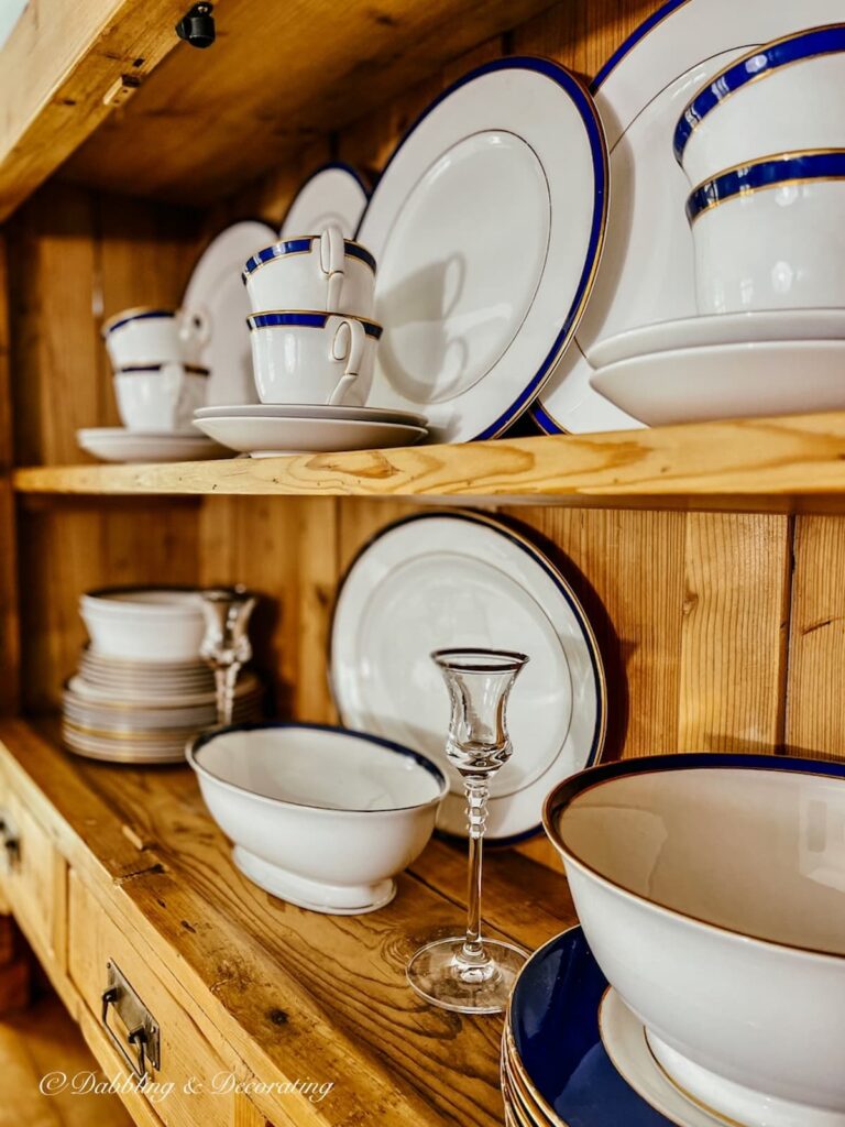 Blue and White wedding china in vintage china hutch.