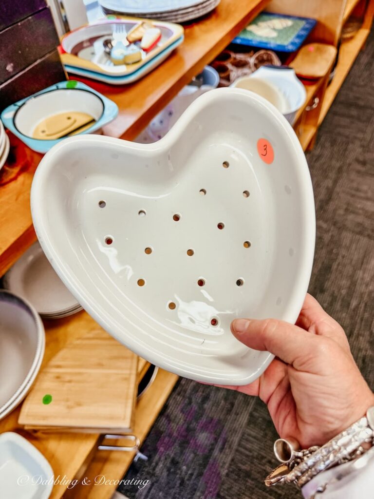 Ironstone heart strainer in hand at Thrift store. Vintage Valentine's Day Decor ideas.