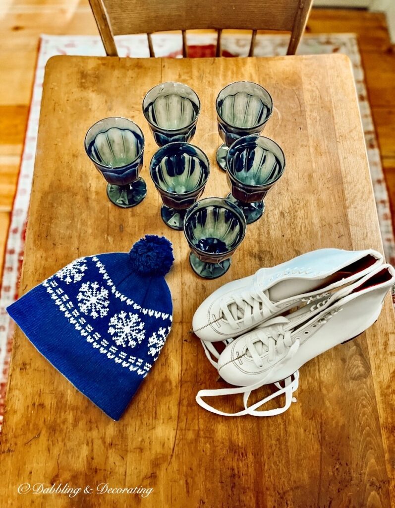 Vintage skates, hat, glassware