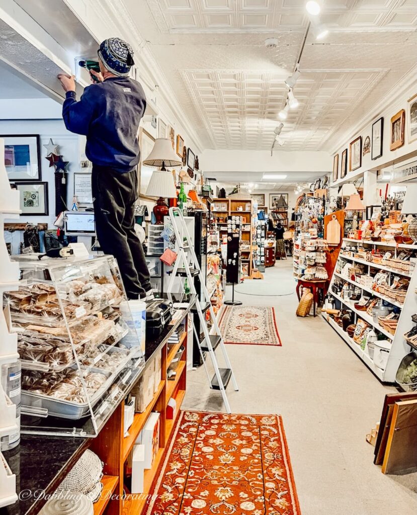 Man Hanging Shelving