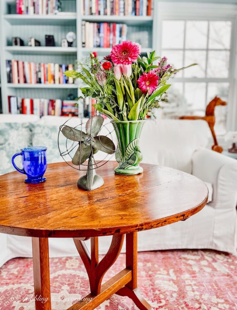 Table with Flowers, Vintage Fan and Glass