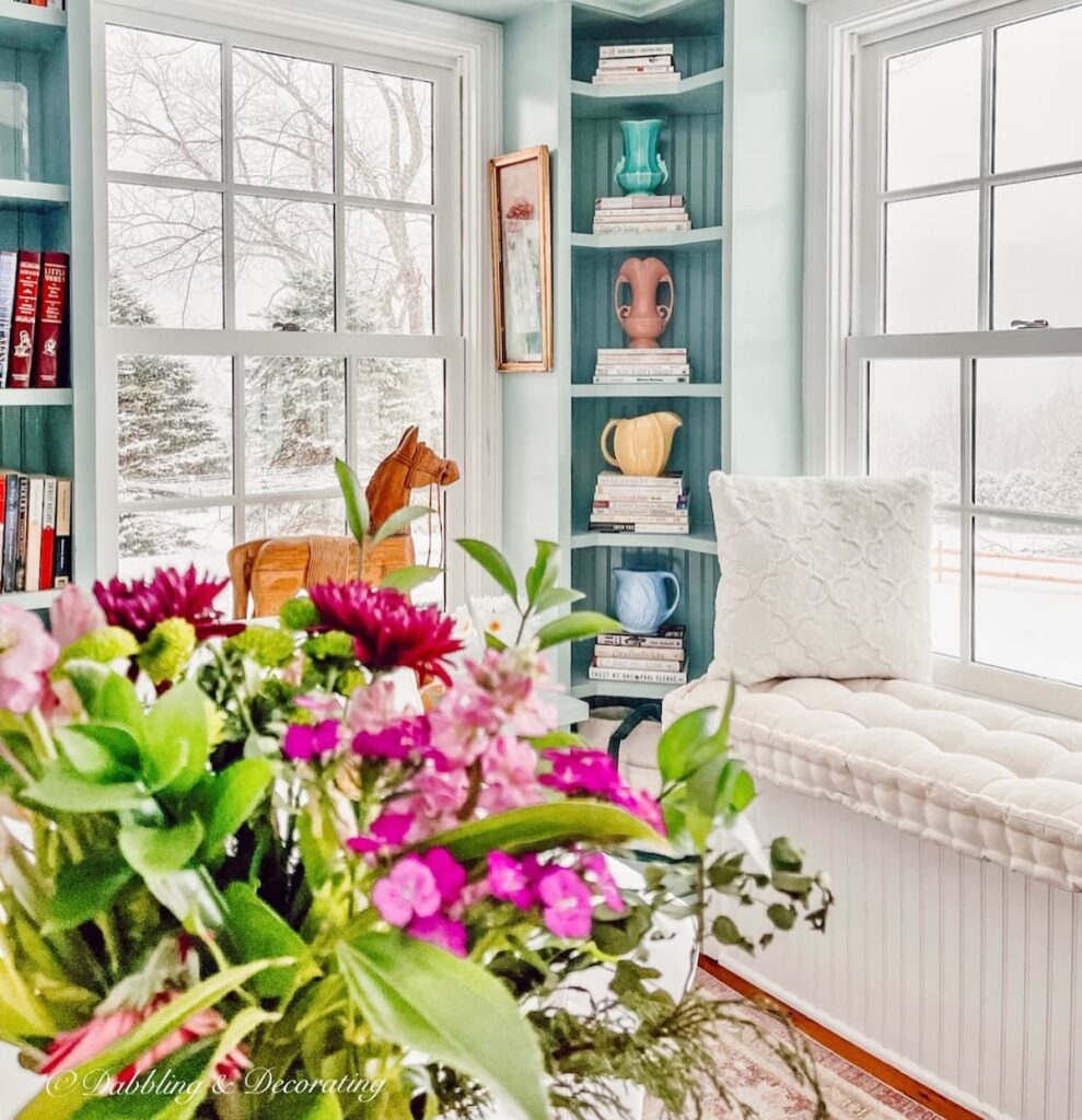 Vintage Eclectic decor in new craft room space with vibrant colors and flowers.