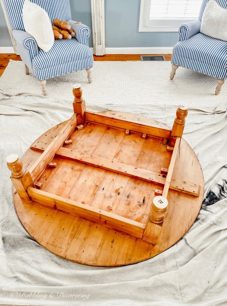 Breakfast nook table with sawed off legs.