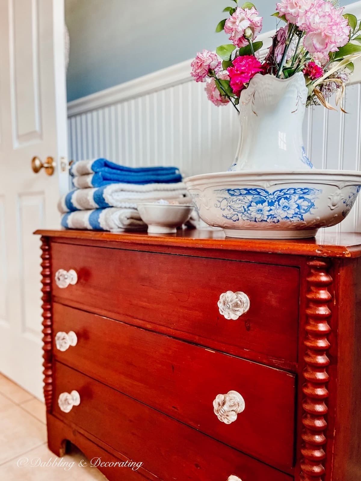 Accent Your Bathroom with a Vintage Dresser Dabbling & Decorating