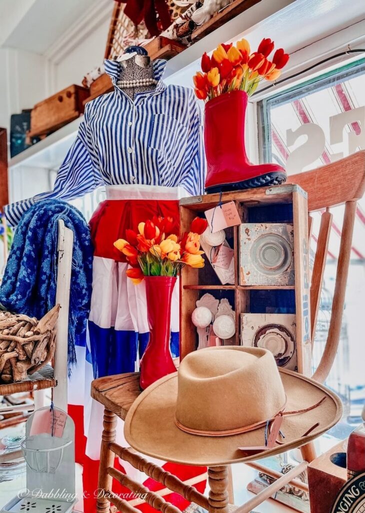 Vintage Booth Display with patriotic dress form mannequin.