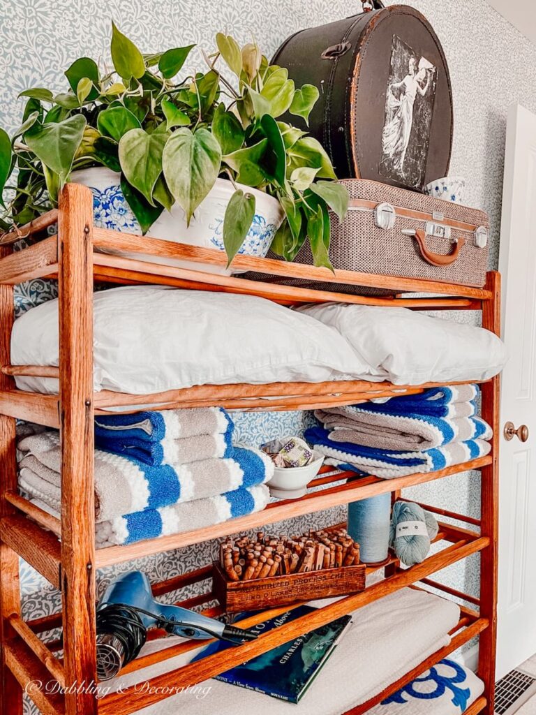 Vintage Cobbler Shoe stand decorated in bedroom with vintage decor.