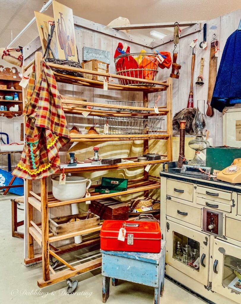 vintage cobbler shoe stand in antique store.