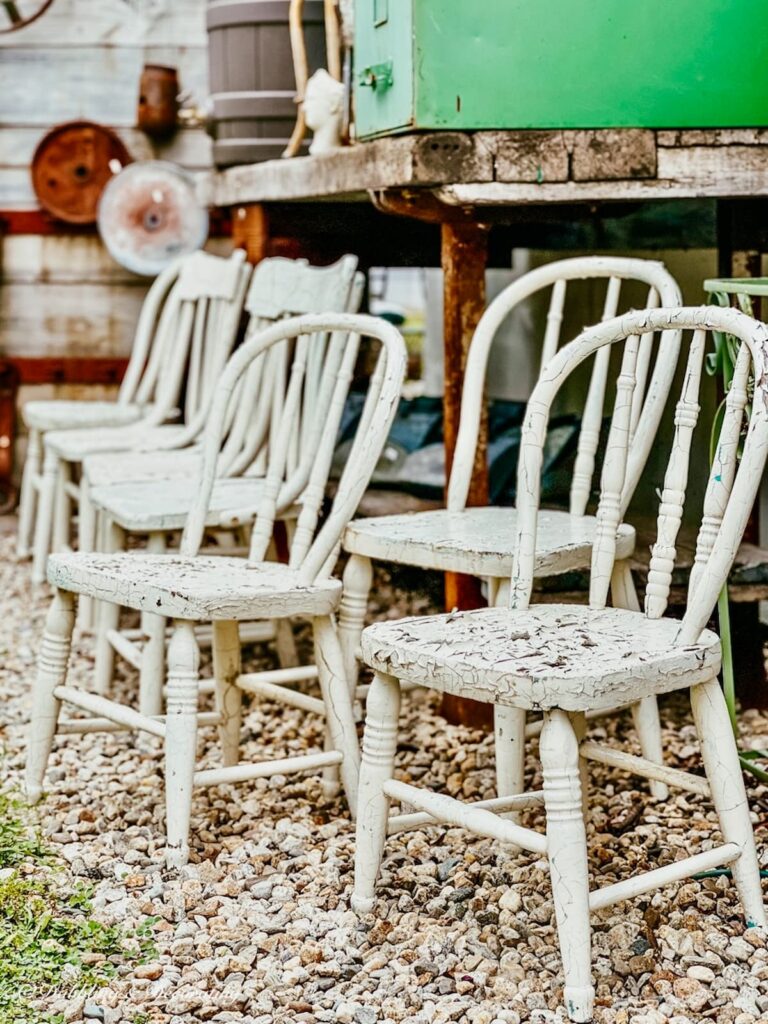6 White chippy thrift chairs