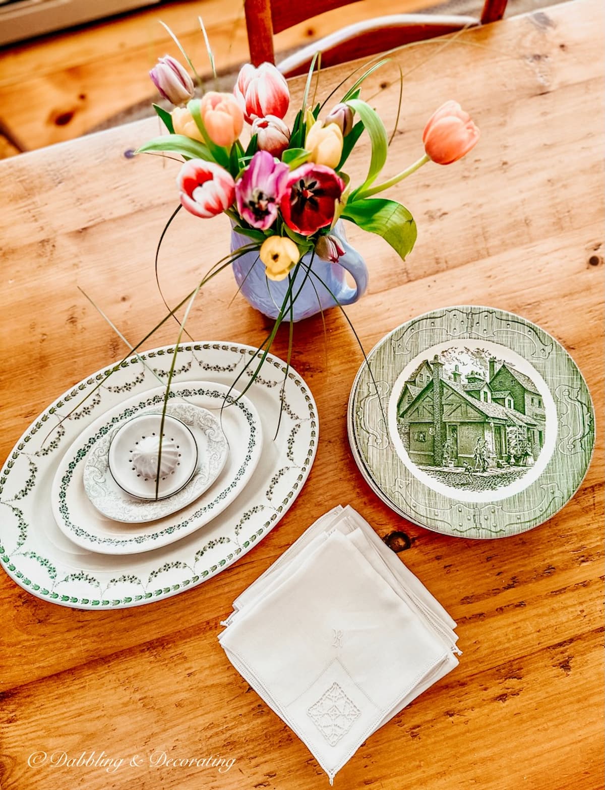 Summer thrift finds, green and white platters with tulips.