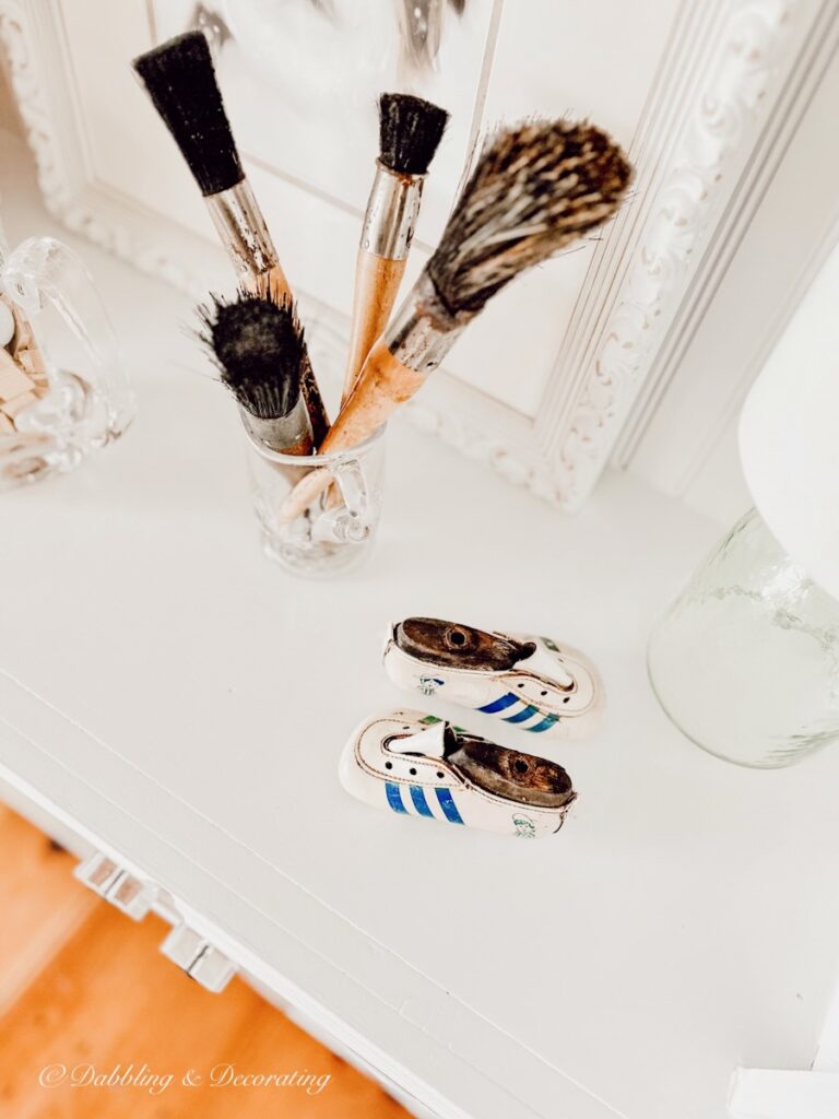 Vintage Baby Shoes on Shelf