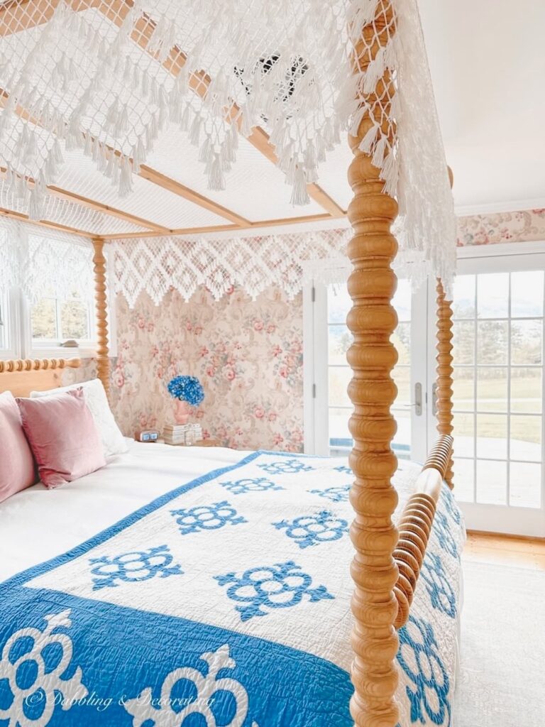 Spindle Canopy Bed with lace canopy.