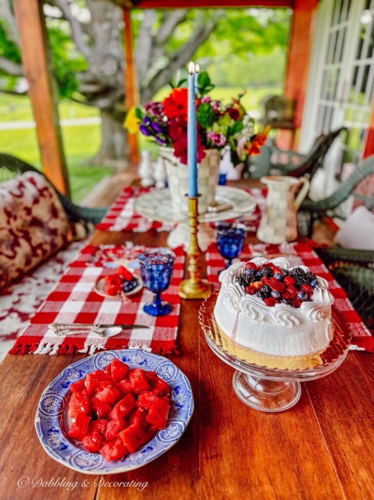 Summer outdoor porch table setting.  red, white, and blue