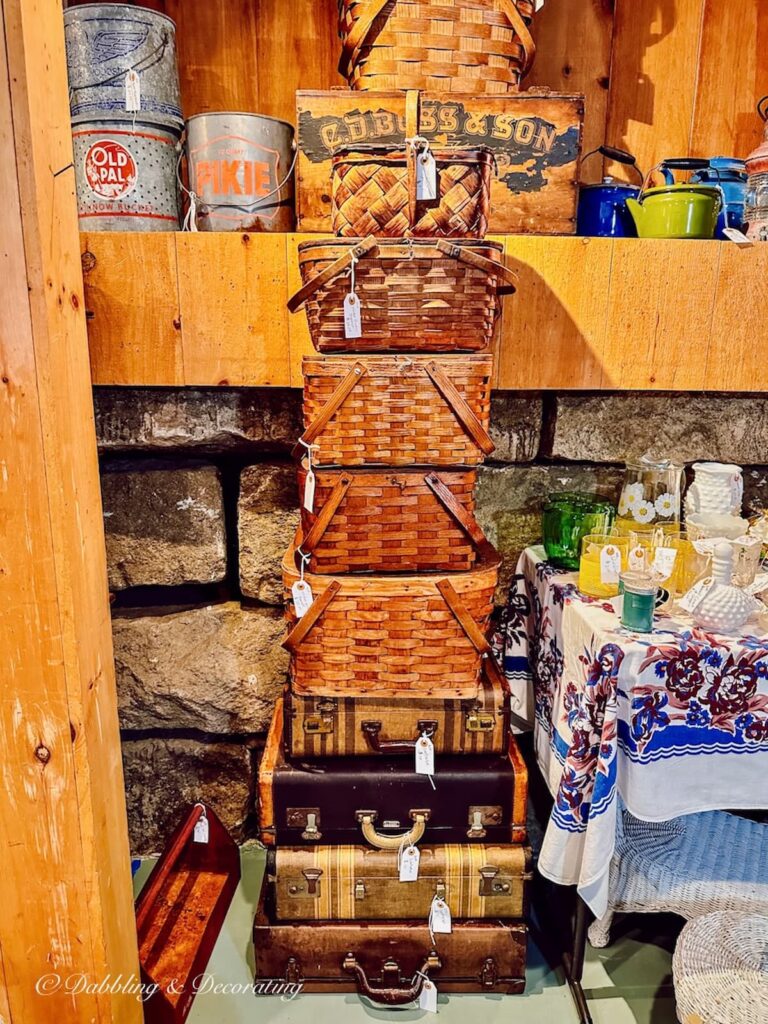 Vintage Picnic Baskets stacked at the best Garden Variety Market