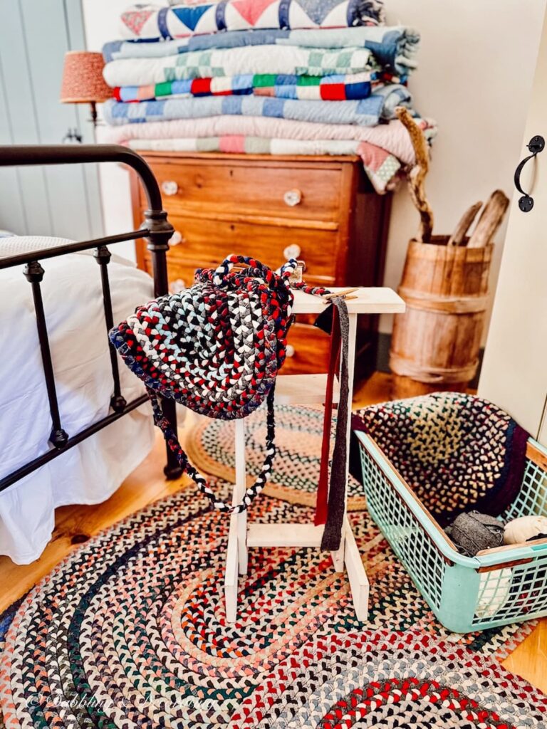 Vintage Braiding Rug Stand and braided rugs in bedroom