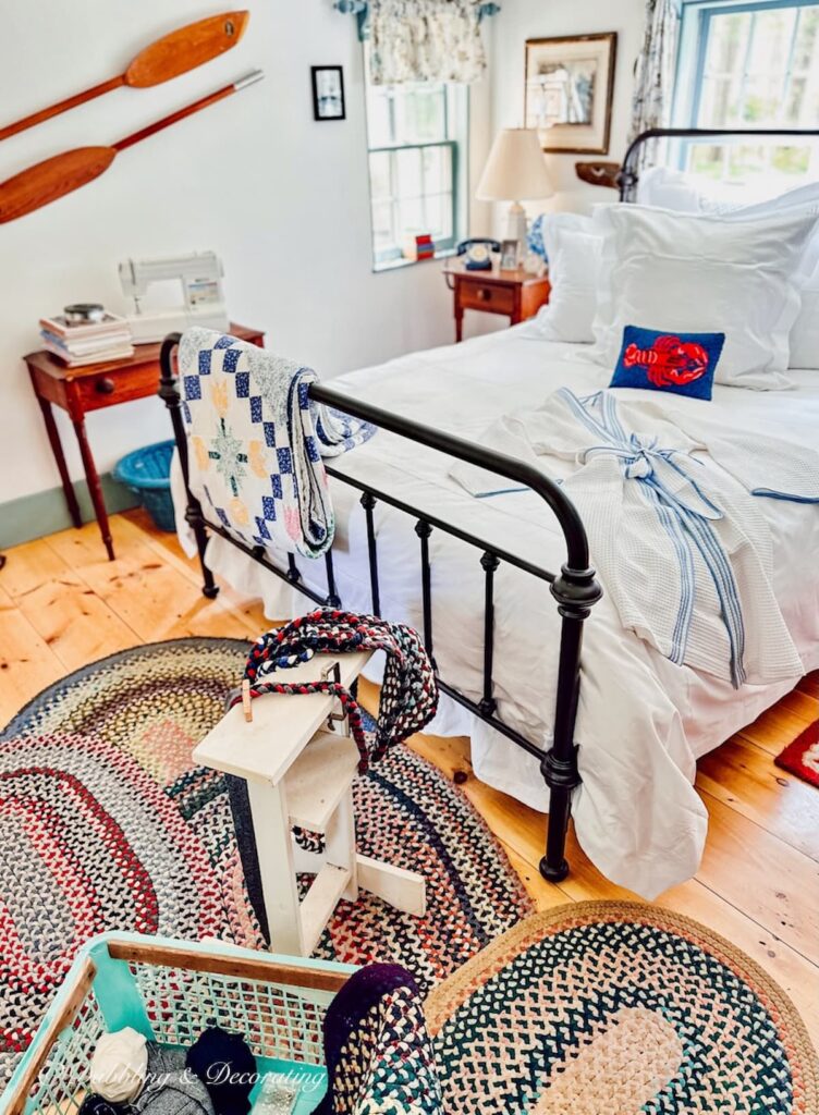 Handmade braided rugs collection scattered on bedroom wood floor