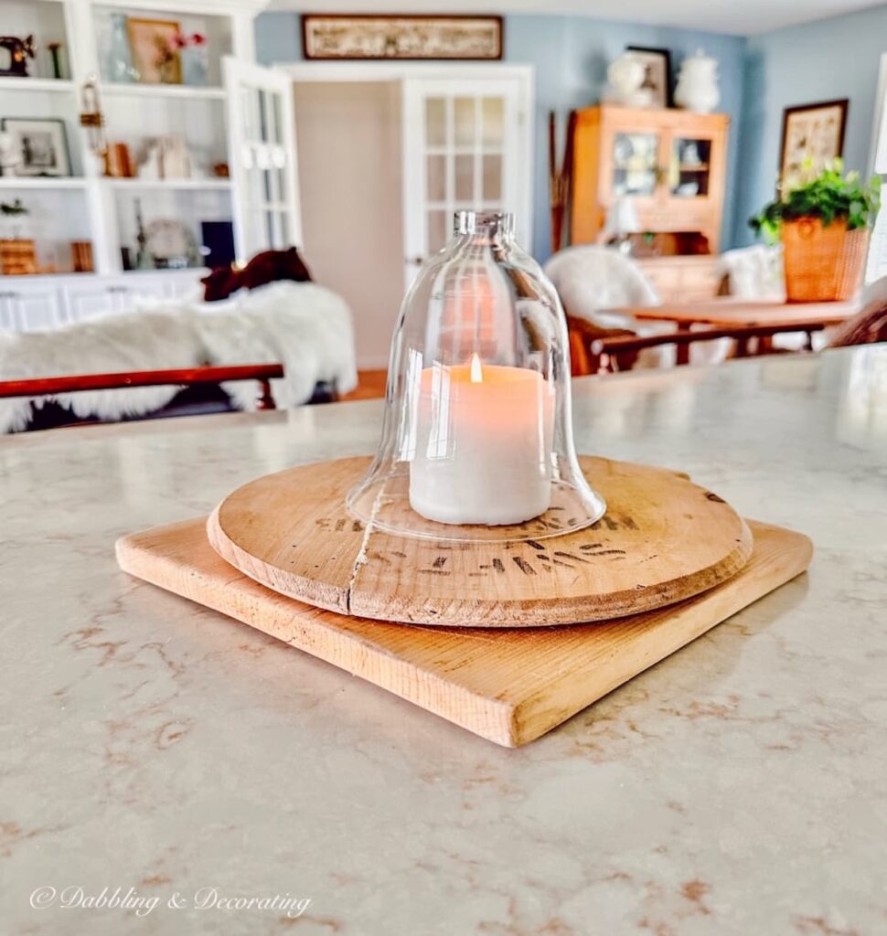 Breadboards with candle and cloche