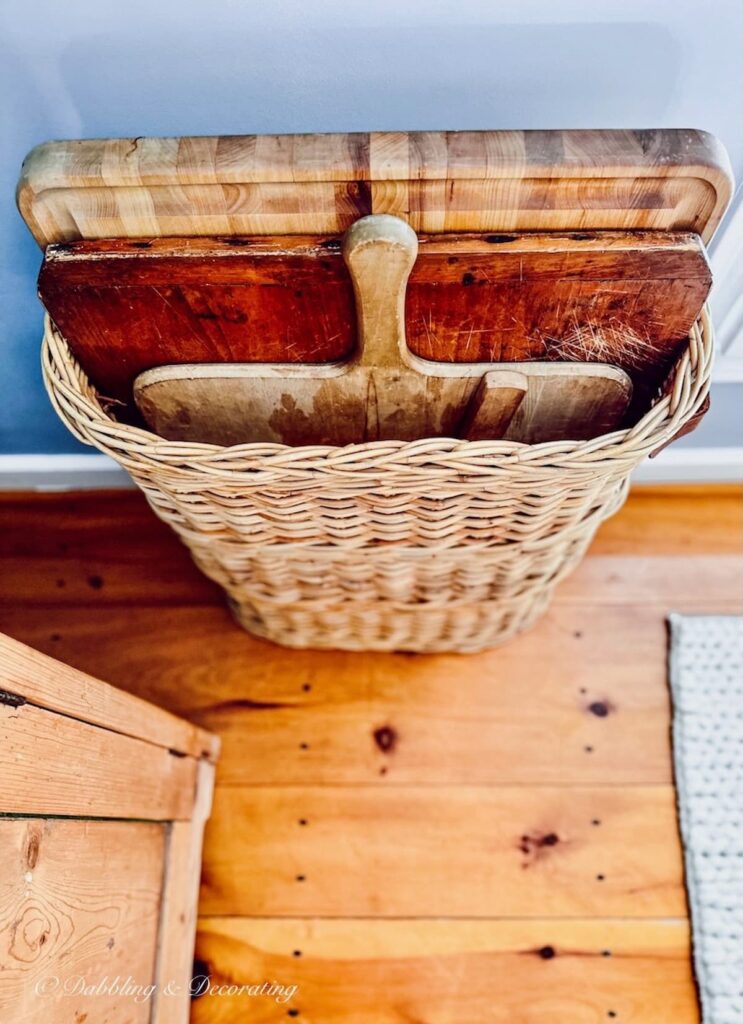 Breadboards and cutting boards in a basket