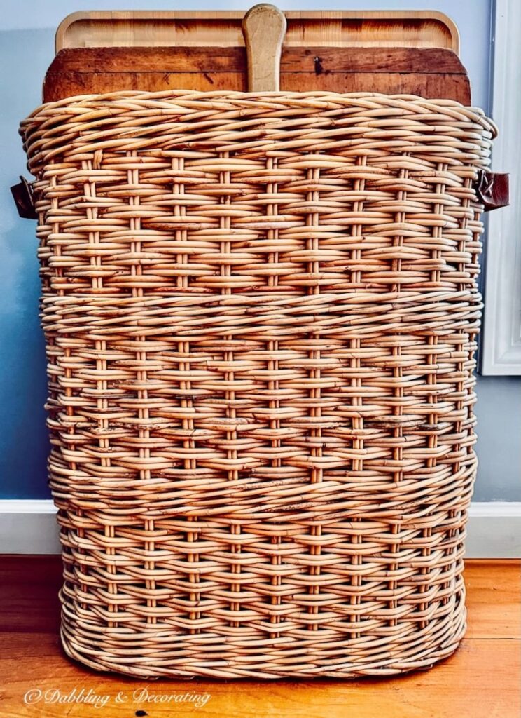 Large basket filled with rustic breadboards