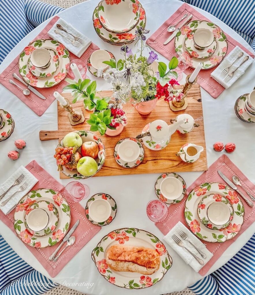 Round pink and green vintage summer table setting.