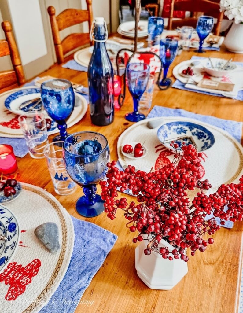 Faux Red Berries in a white pitcher