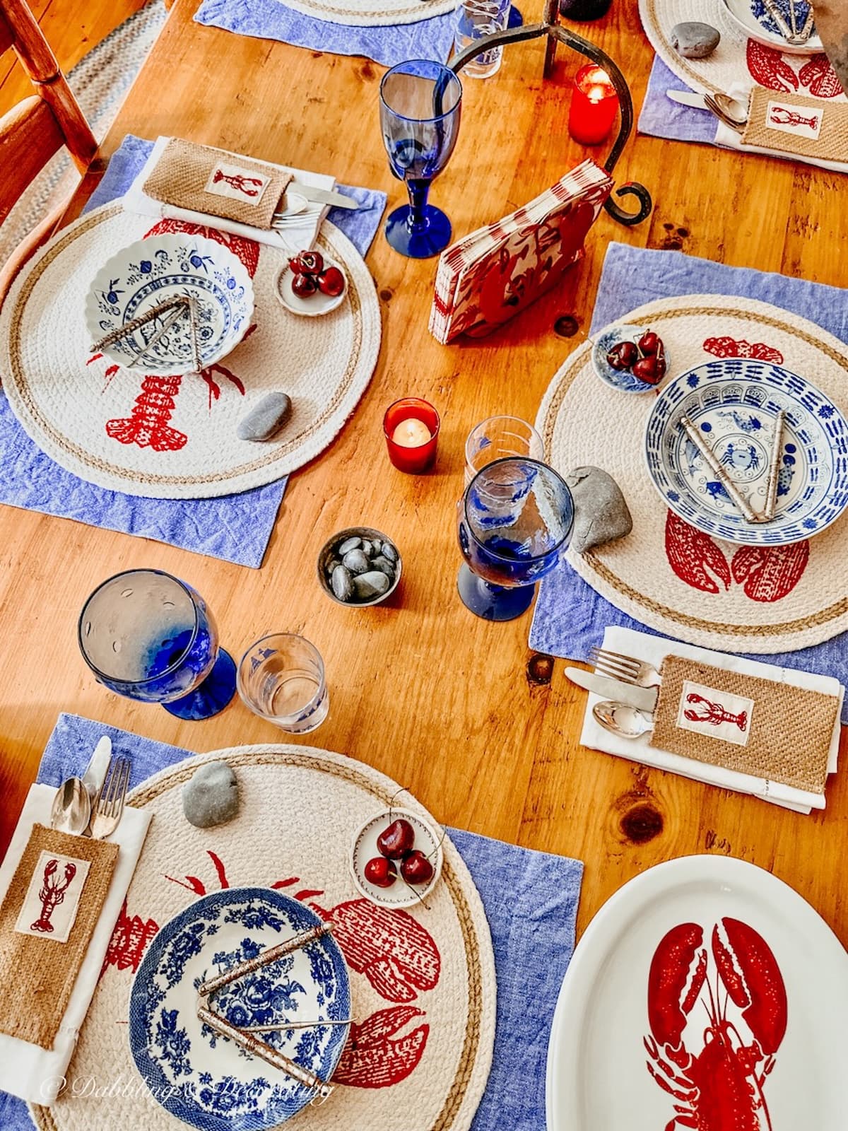 Red, white, and blue lobster summer tablescape with vintage finds as example for our Vintage Decor Styling Challenge.