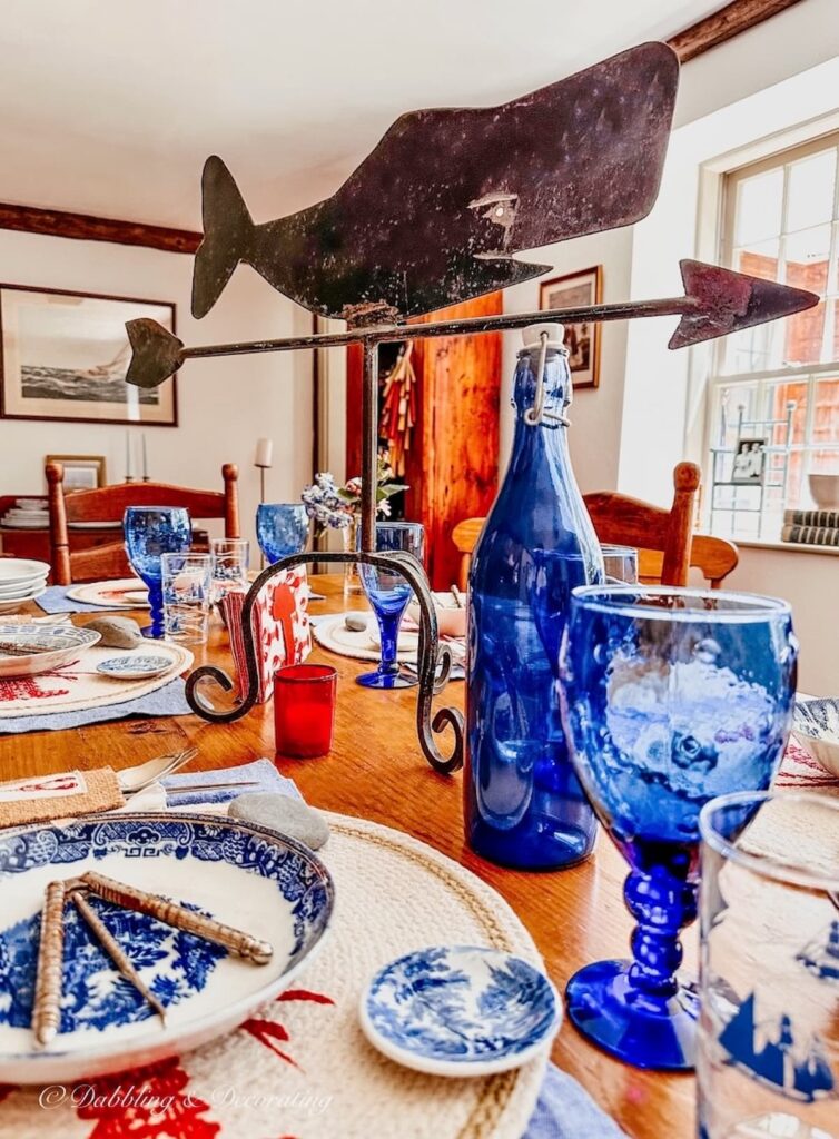 Red, white, and blue summer table setting with Whale Centerpiece