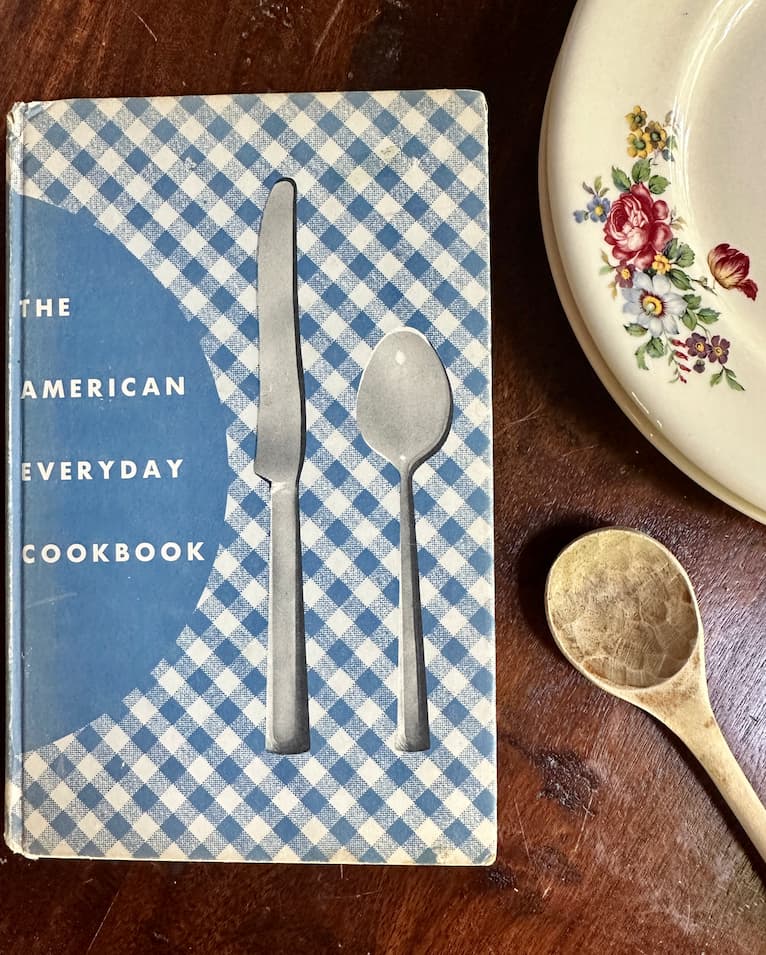 Cookbook and Wooden Spoon