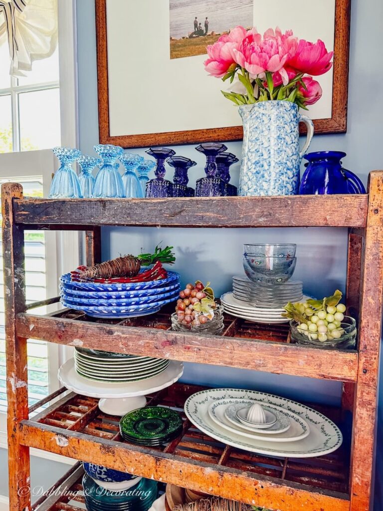 Storing and Displaying Vintage Dishes in an Antique Cobblers Rack