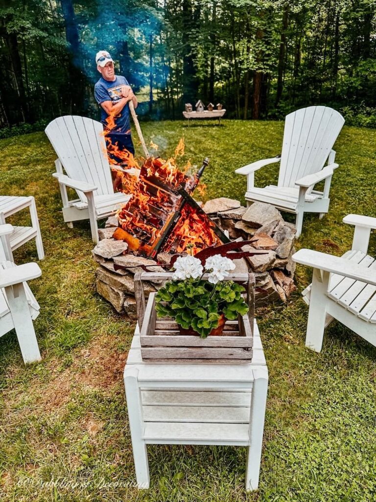 Adirondack Chairs around Stone Fire Pit 