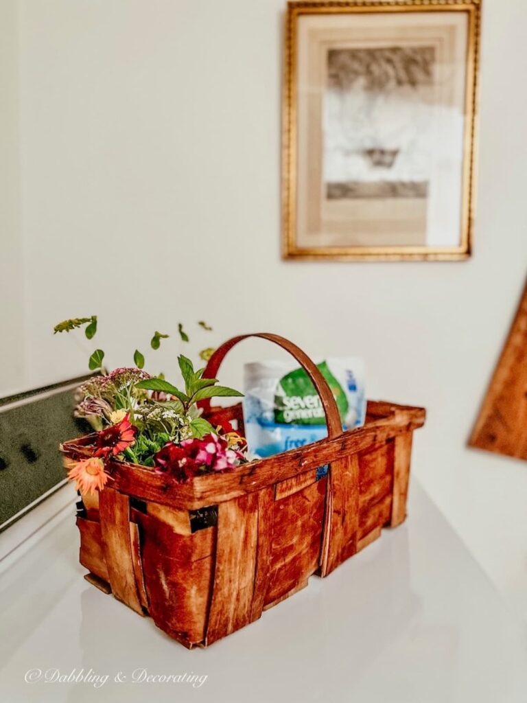 Vintage Basket of Flowers and Laundry Detergent