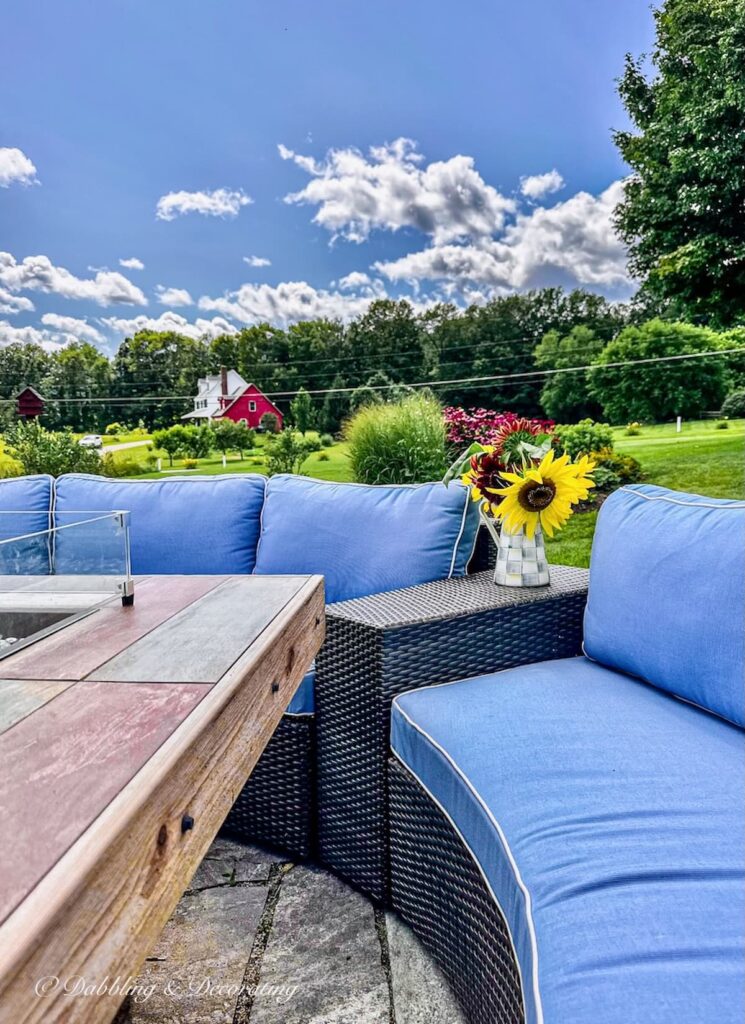 Blue outdoor Sectional around Fire Pit