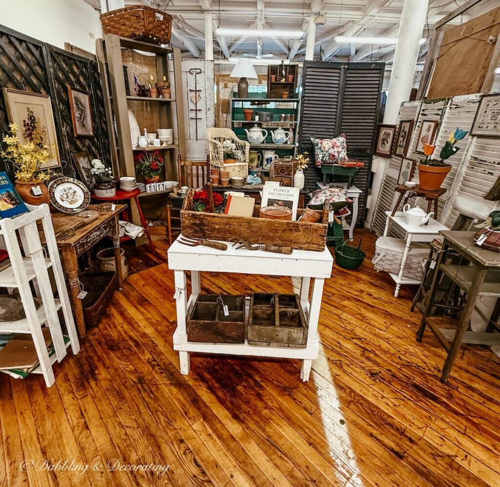 Antique booth inside Cabot Mill Antiques filled with antiques in Brunswick, Maine.