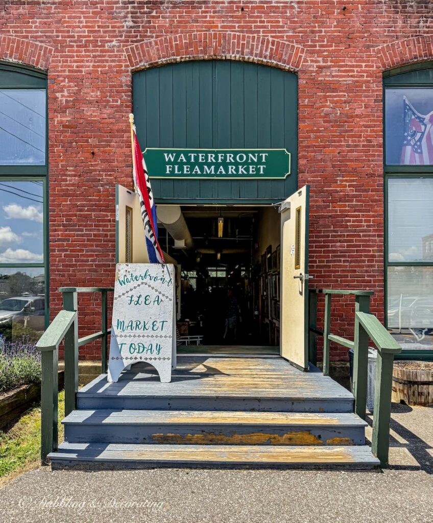 Waterfront Flea Market's brick building entrance in Brunswick, Maine.