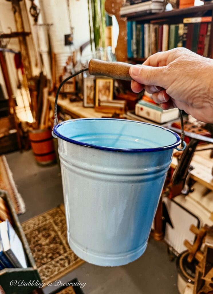 Galvanized blucked, small in hand in blue at Waterfront Flea Market in Brunswick, Maine.