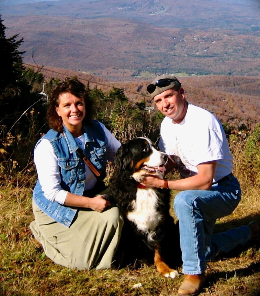 Couple with Bernese Mountain Dog