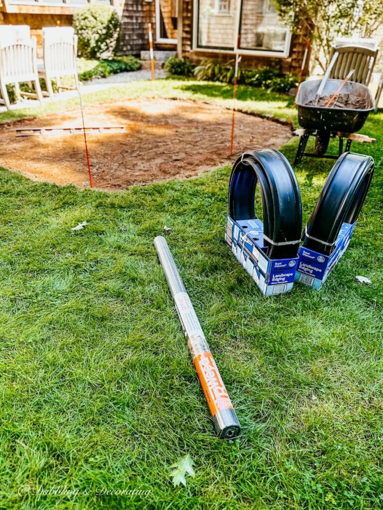 Landscaping edging for pea gravel patio.