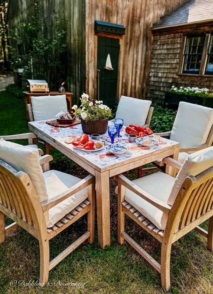 Teak Table Setting with Lobster Dinner