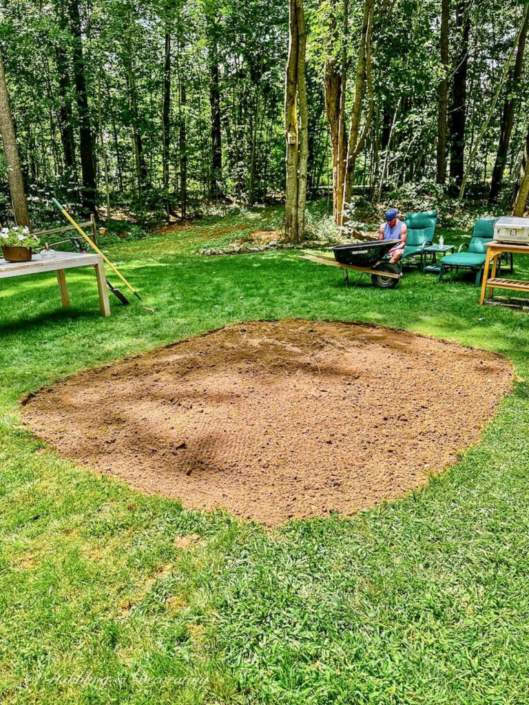 Circular pea gravel Patio Frame Dug Out.