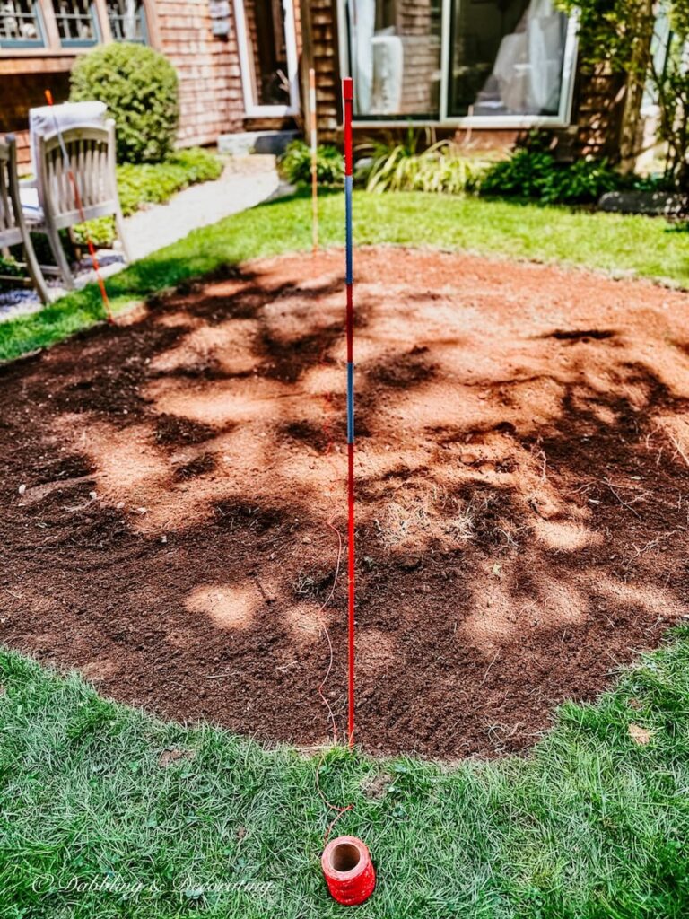 Red Twine, Driveway Marker, and Dirt Patio in the making.