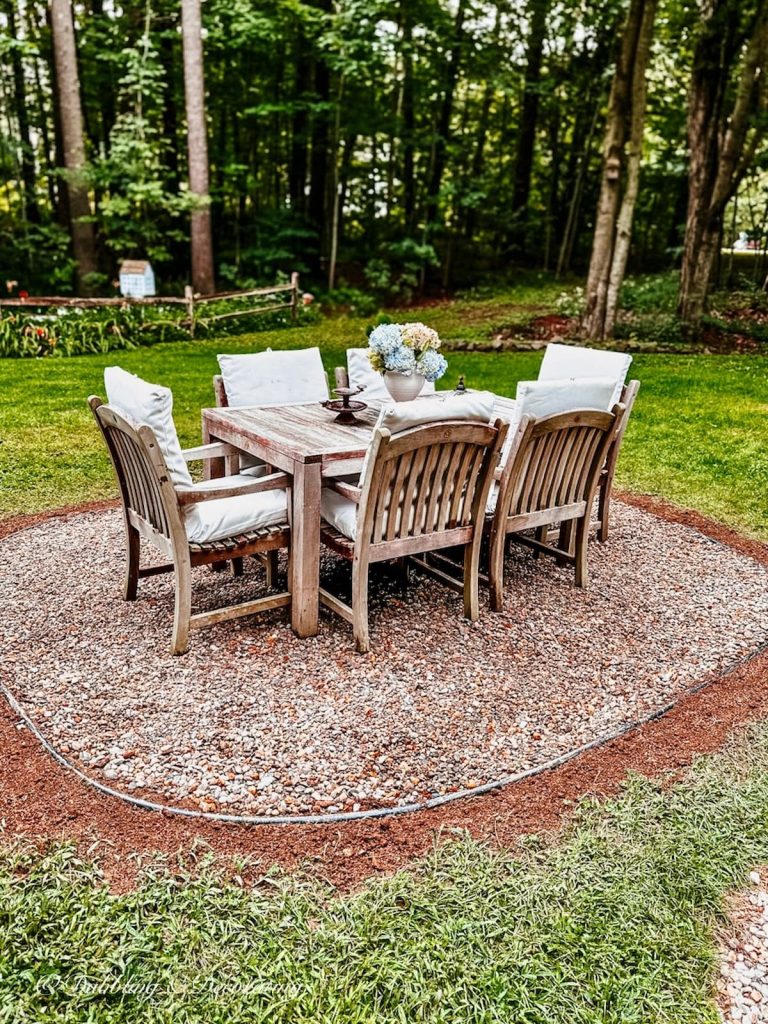 Outdoor Pea Gravel Patio Ideas with Teak Table Setting