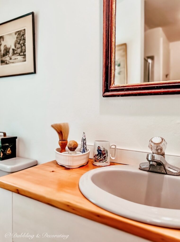 Bathroom Sink with Norman Rockwell Mug