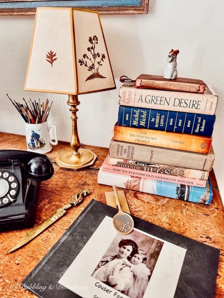 Vintage Desk Top with Books, phone, and mug