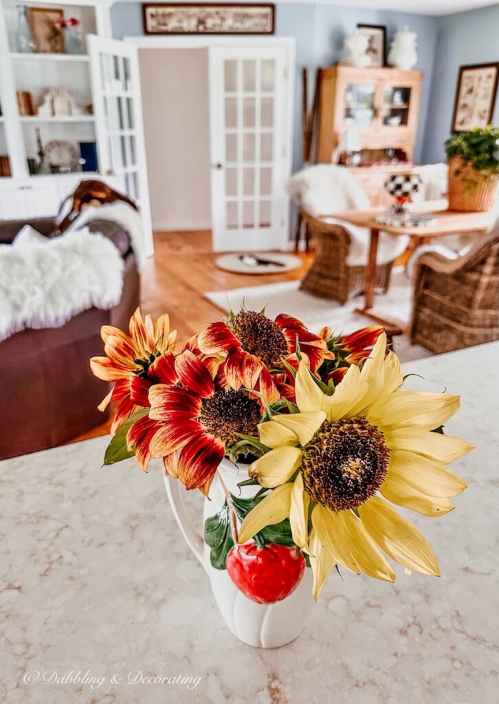 Vintage vase with sunflowers