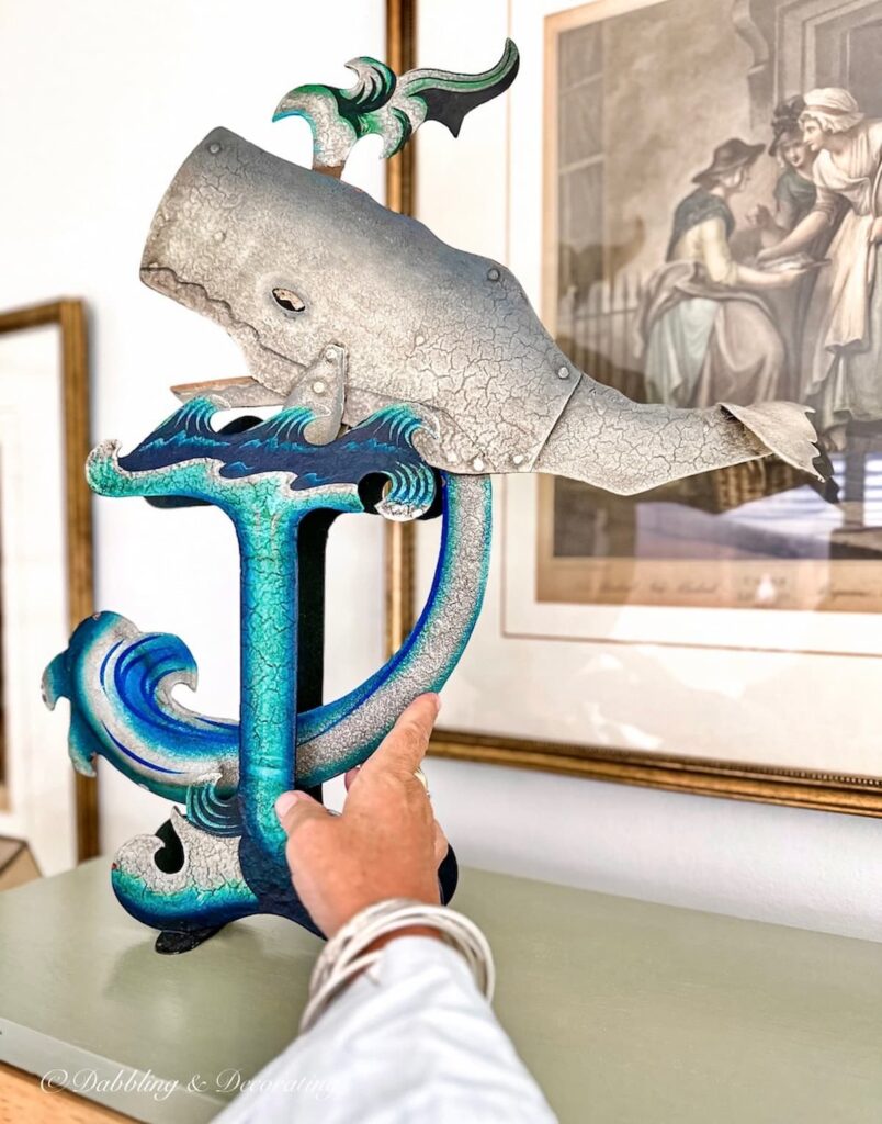 Vintage blue balancing toy whale