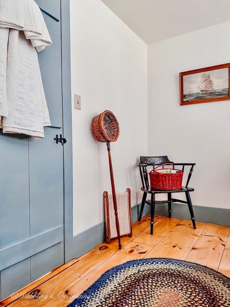 Vintage Bedroom Corner with church collection basket and rope winder.